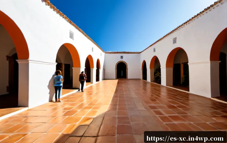 Home 15 예술 공간의 스토리텔링 기법 - Photorealistic contemporary art gallery in a restored Spanish colonial courtyard, a curved visitor p...